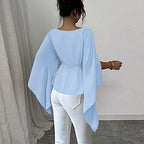 Elegante y con estilo, camisa de manga larga con abertura